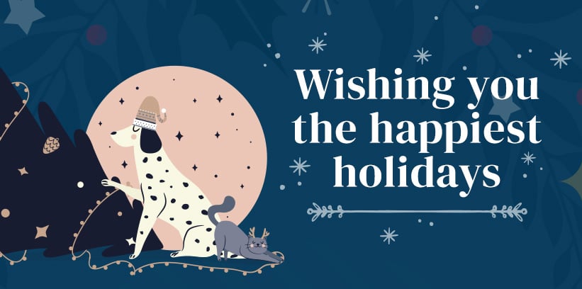 Wishing you the happiest holiday text with graphic of a dog and a cat playing with a christmas tree